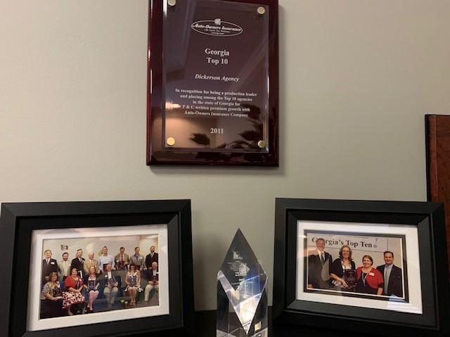 Dickerson Agency Awards on a shelf