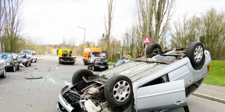 a Car Wrecked upside down.