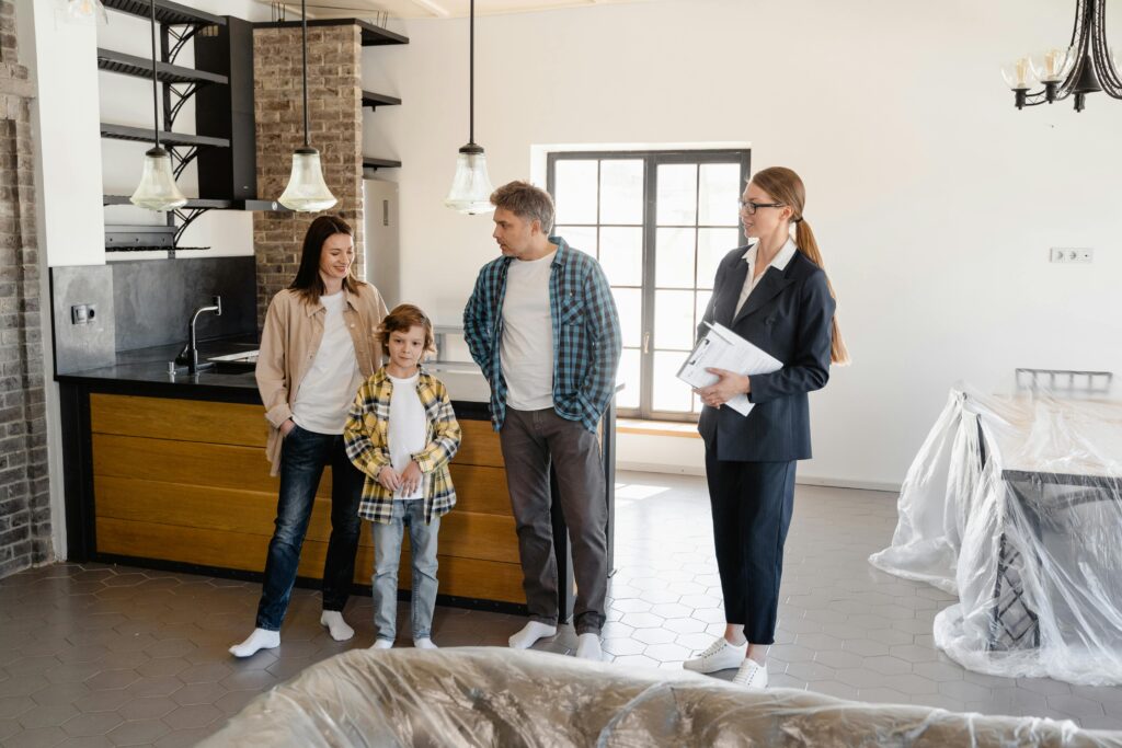 A Family stands in their newly renovated kitchen.